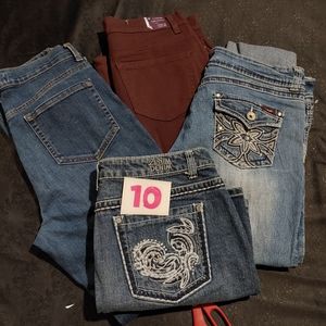 Four pairs of size 10 pants